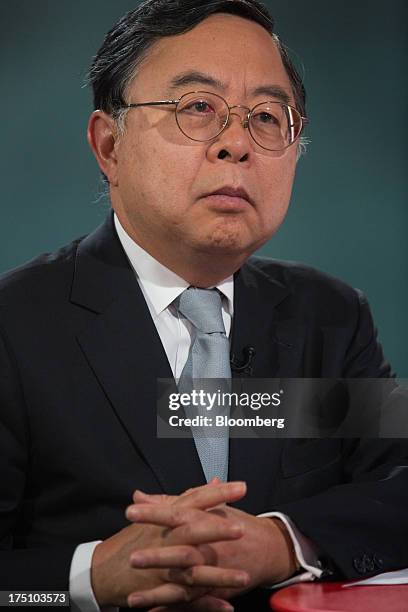 Ronnie Chan, chairman of Hang Lung Properties Ltd., pauses during a Bloomberg Television interview in Hong Kong, China, on Thursday, Aug. 1, 2013....