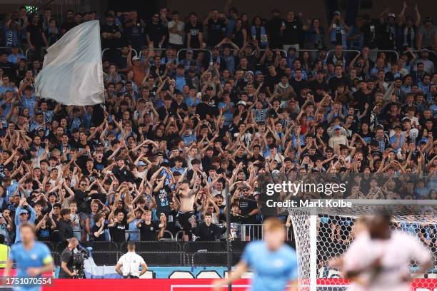 Sydney FC supporters sing during the A-League Men round one match between Sydney FC and Melbourne Victory at Allianz Stadium, on October 21 in...