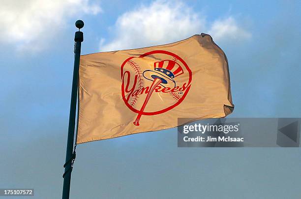 Yankees flag is seen during a game between the New York Yankees and the Tampa Bay Rays at Yankee Stadium on July 26, 2013 in the Bronx borough of New...