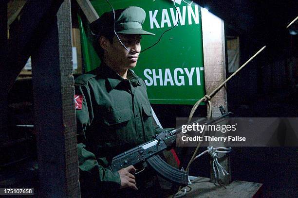 Soldier from the Kachin Independence Army guards the entrance of the army's border post with China. With its 6,000 troops, the KIA is one of the best...