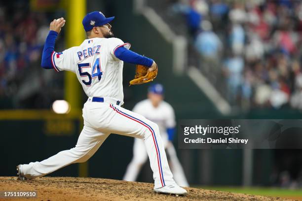 Martin Perez of the Texas Rangers pitches during Game 2 of the 2023 World Series between the Arizona Diamondbacks and the Texas Rangers at Globe Life...