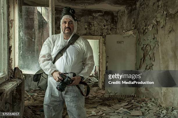 photographer at work in chernobyl - chernobyl stock pictures, royalty-free photos & images