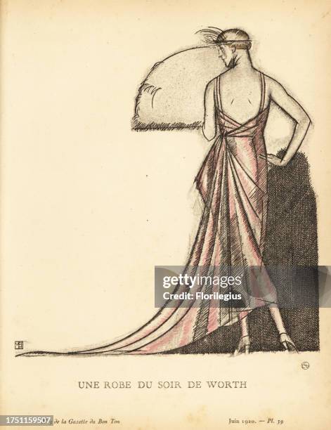 Woman in evening dress of silver lame by Worth. Une Robe du Soir de Worth. Cette robe du soir, de Worth, est un drapé en lamé argent se terminant en...