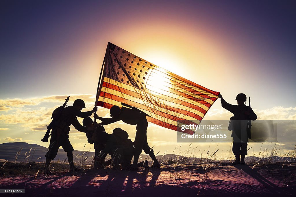 Solider Rising Flag Wwii Soldiers Raising The American Flag At Sunset High-Res Stock Photo ...