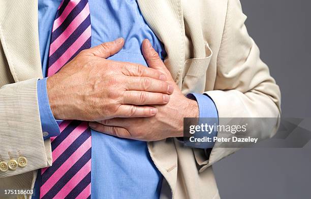 senior man having a stroke/heart attack - moving image stock pictures, royalty-free photos & images