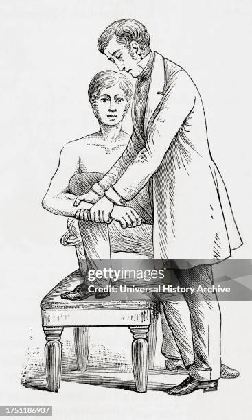 Reduction of dislocation of elbow. From The Household Physician, published c.1898.