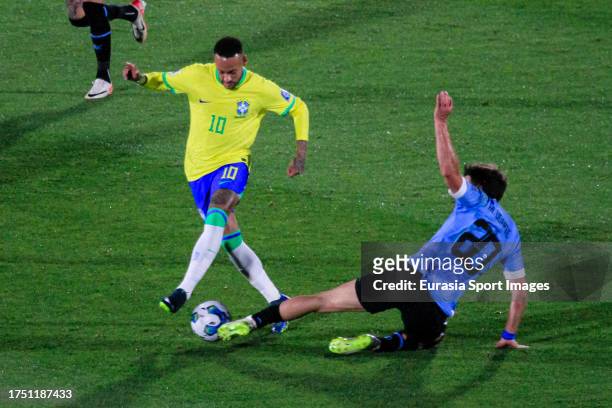 Neymar Junior of Brazil dribbles Manuel Ugarte of Uruguay during FIFA World Cup 2026 Qualifier match between Uruguay and Brazil at Centenario Stadium...
