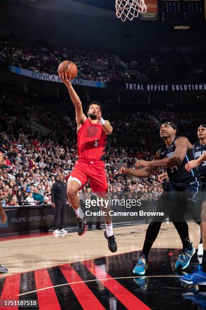 Skylar Mays of the Portland Trail Blazers drives to the basket during the game against the Orlando Magic on October 27, 2023 at the Portland Trail...