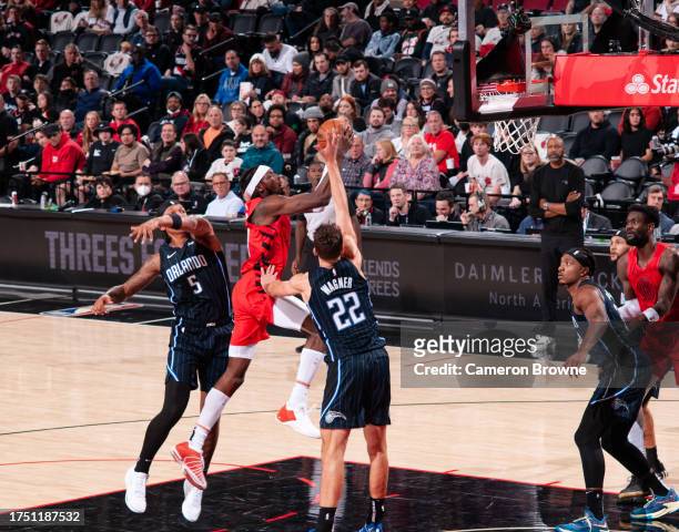Jerami Grant of the Portland Trail Blazers drives to the basket during the game against the Orlando Magic on October 27, 2023 at the Portland Trail...