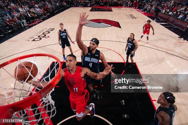 Malcolm Brogdon of the Portland Trail Blazers drives to the basket during the game against the Orlando Magic on October 27, 2023 at the Portland...