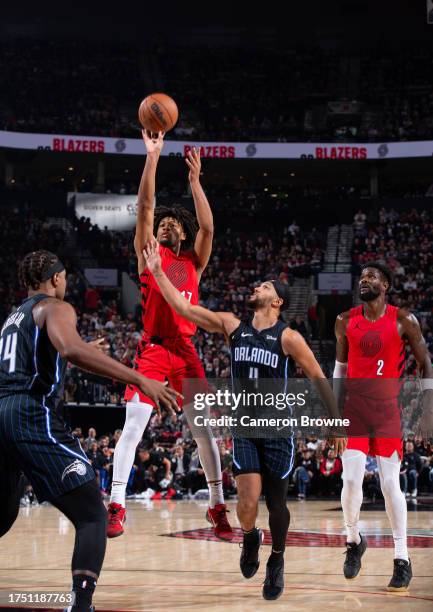 Shaedon Sharpe of the Portland Trail Blazerss hoots the ball during the game against the Orlando Magic on October 27, 2023 at the Portland Trail...