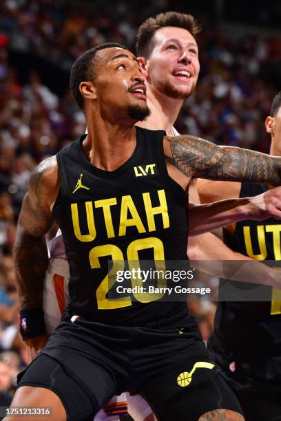Players box out during the game on October 28, 2023 at Footprint Center in Phoenix, Arizona. NOTE TO USER: User expressly acknowledges and agrees...