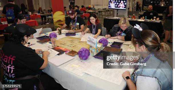 Attendees play Dungeons & Dragons during TwitchCon 2023 Las Vegas at the Las Vegas Convention Center on October 22, 2023 in Las Vegas, Nevada.