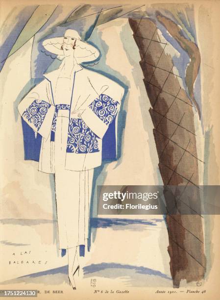 Woman in a beach outfit in white and navy blue silk for the Balearic Islands by de Beers. A las Baleares. Costume tailleur de Beer. Plate 48, Issue...