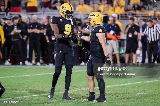 Arizona State Sun Devils wide receiver Troy Omeire and Arizona State Sun Devils running back Cameron Skattebo slap hands during the college football...