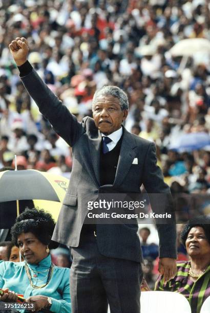 African National Congress leader Nelson Mandela rises his right fist during a rally in Soweto on February 13, 1990 in Johannesburg, South Africa.