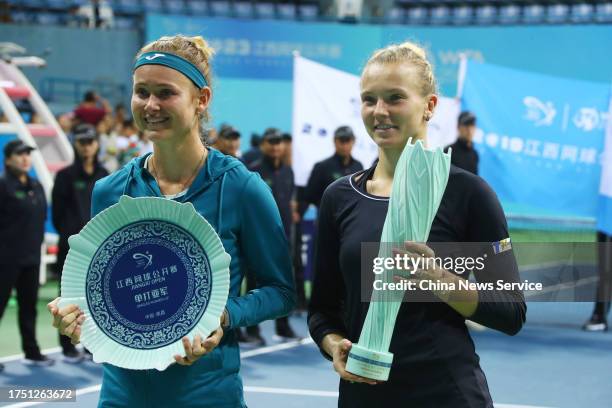 Gold medalist Katerina Siniakova of Czech Republic and silver medalist Marie Bouzkova of Czech Republic pose with trophies during the medal ceremony...