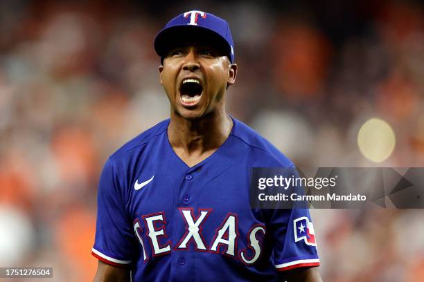 Jose Leclerc of the Texas Rangers celebrates after striking out Jon Singleton of the Houston Astros to end the eighth inning in Game Six of the...