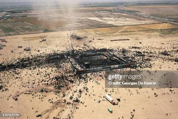 Faithful attend the funeral for Ayatollah Ruhollah Khomeini on June 6, 1989 in Tehran, Iran.