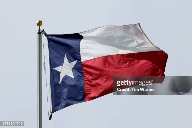 The Texas flag is seen before the game between the Houston Cougars and the Texas Longhorns at TDECU Stadium on October 21, 2023 in Houston, Texas.