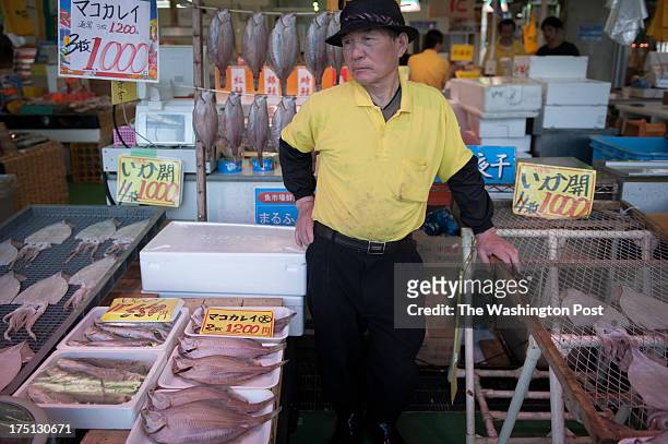 Eichi Suzuki sells fishes from Hokaido, Northern Island of Japan at local fish market in Onahama harbor in Iwaki. Mr.Suzuki who has been working at...
