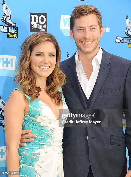 Host Sophia Bush and Google executive Dan Fredinburg arrive at the DoSomething.org and VH1's 2013 Do Something Awards at Avalon on July 31, 2013 in...