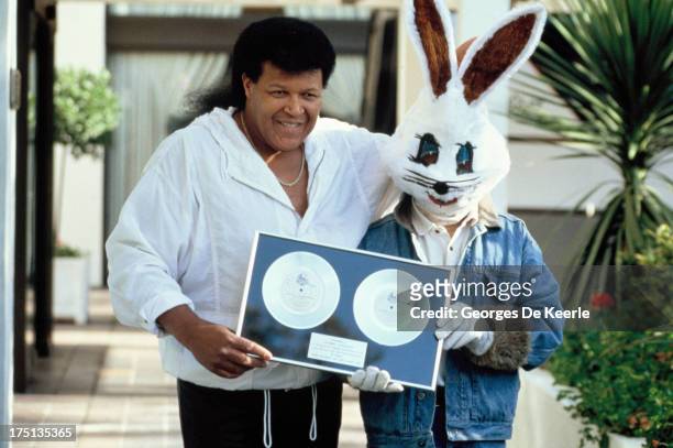 American singer-songwriter Chubby Checker with Jive Bunny on October 25, 1989 in London, England. Jive Bunny & The Mastermixers had produced a...