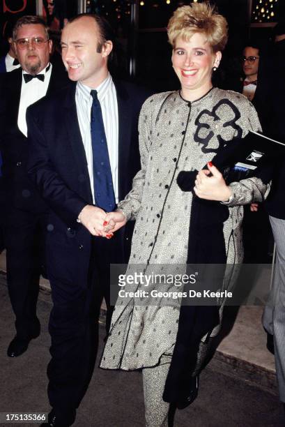 English musician Phil Collins and his pregnant wife Jill Tavelman attend the premier of 'Scandal' on March 3, 1989 in London, England.