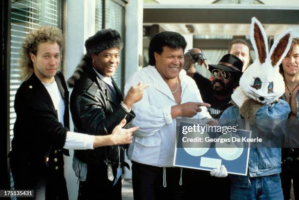 American singer-songwriter Chubby Checker with Jive Bunny and The Mastermixers on October 25, 1989 in London, England. Jive Bunny & The Mastermixers...