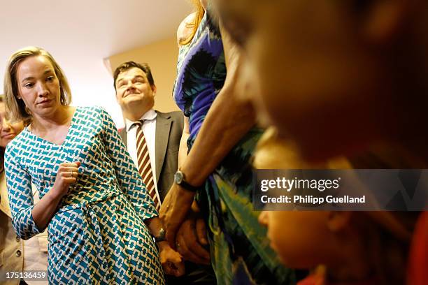 German Family Minister Kristina Schroeder chats with children and employees while visiting the TDKG Turkish-German Kindergarten on the day a new law...