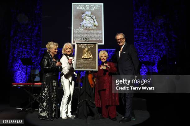 Connie Smith, honoree, Tanya Tucker, Brenda Lee and CEO of the Country Music Hall of Fame and Museum, Kyle Young pose onstage during the Class of...