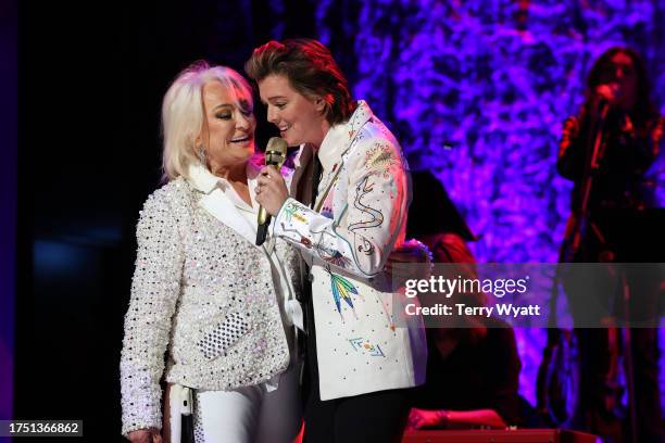 Honoree, Tanya Tucker joins Brandi Carlile onstage during the Class of 2023 Medallion Ceremony at Country Music Hall of Fame and Museum on October...