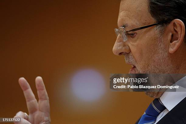 Spanish Prime Minister Mariano Rajoy speaks during Parliament session over allegations on corruption scandals on August 1, 2013 in Madrid, Spain....