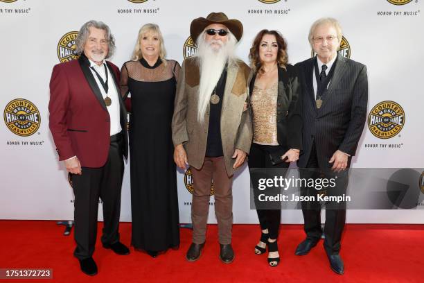 Richard Sterban, William Lee Golden, and Duane Allen of The Oak Ridge Boys pose with Donna Sterban and Simone De Staley at the Class of 2023...