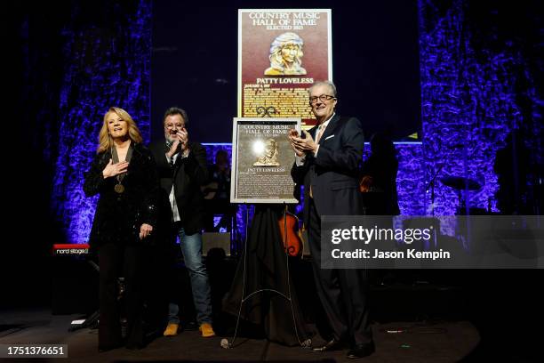 Honoree, Patty Loveless, Vince Gill and CEO of the Country Music Hall of Fame and Museum, Kyle Young speak onstage during the Class of 2023 Medallion...