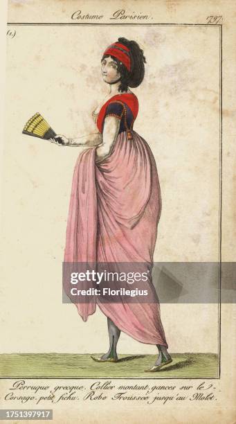 Fashionable woman of the Directory era, Paris. Greek wig. High necklace, corded bodice, small kerchief. Dress raised up to the calf. Perruque...