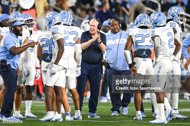 North Carolina head coach Mack Brown encourages his defense during the college football game between the North Carolina Tar Heels and the Georgia...