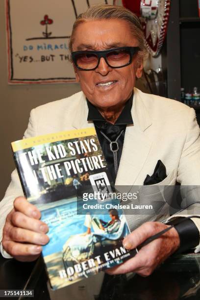 Producer Robert Evans signs copies of his new book "The Kid Stays In The Picture" at Book Soup on July 31, 2013 in West Hollywood, California.