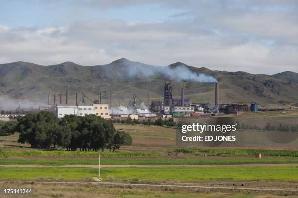 Photo taken on August 20, 2012 shows a general view of a rare earth refinery north of the inner Mongolian city of Baotou. On the edge of the Chinese...