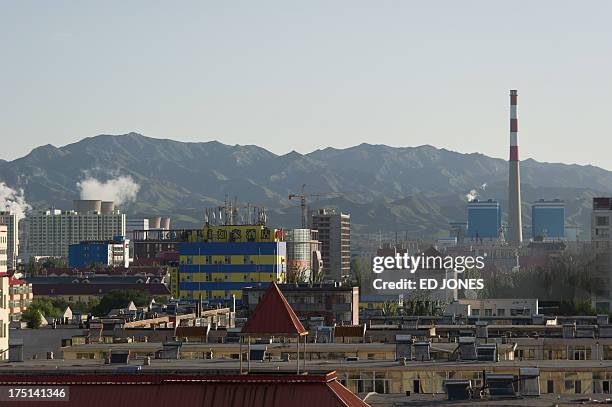 Photo taken on August 20, 2012 shows the skyline of the inner Mongolian city of Baotou. On the edge of the Chinese city of Baotou, a...