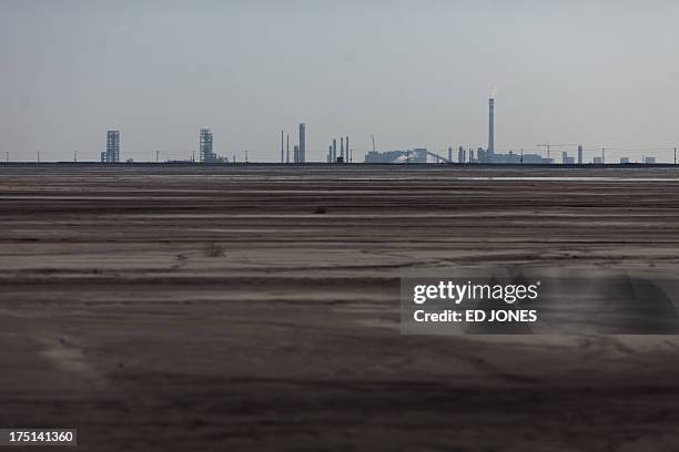 Photo taken on August 19, 2012 shows a general view of a 'toxic lake' surrounded by rare earth refineries near the inner Mongolian city of Baotou. On...