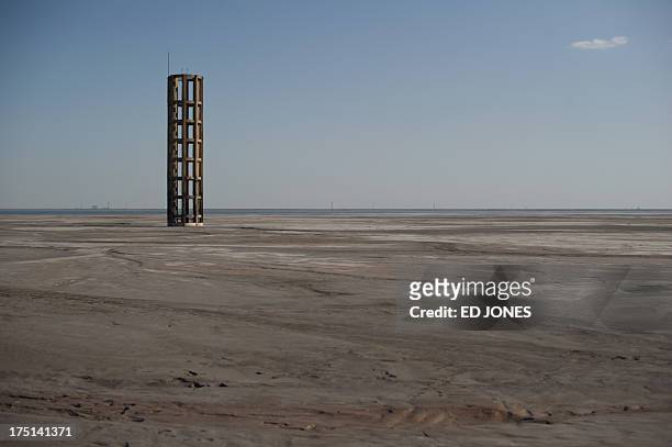 Photo taken on August 19, 2012 shows a general view of a 'toxic lake' surrounded by rare earth refineries near the inner Mongolian city of Baotou. On...