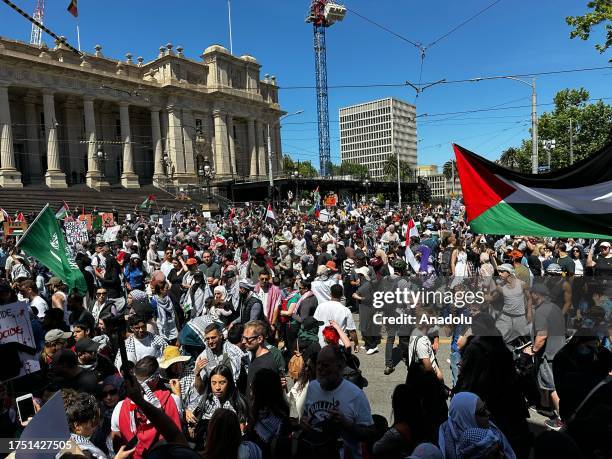 Tens of thousands of pro-Palestinian demonstrators, holding banners and Palestinian flags, hold a pro-Palestinian rally to solidarity with the...