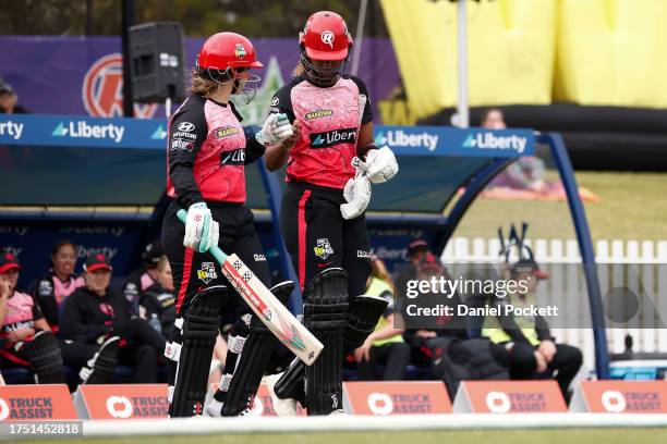 Tammy Beaumont of the Renegades and Hayley Matthews of the Renegades walk out to bat during the WBBL match between Melbourne Renegades and Adelaide...