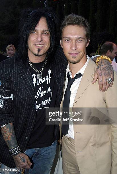 Nikki Sixx and Taylor Hanson at the City of Hope Spirit Award Honoring Van Toffler at Green Acres Estate, home of Ron Burkle. The event raised $2.2...