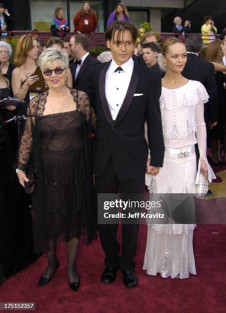 Johnny Depp with his mother and Vanessa Paradis during The 76th Annual Academy Awards - Arrivals by Jeff Kravitz at Kodak Theatre in Hollywood,...