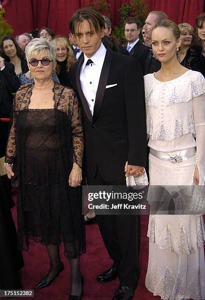 Johnny Depp with his mother and Vanessa Paradis during The 76th Annual Academy Awards - Arrivals by Jeff Kravitz at Kodak Theatre in Hollywood,...