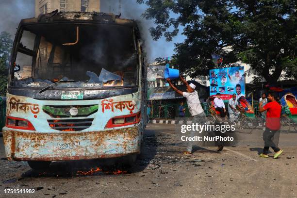 Unidentified miscreants set a public bus on fire during a countrywide strike from dawn to dusk called by the Bangladesh Nationalist Party ,...