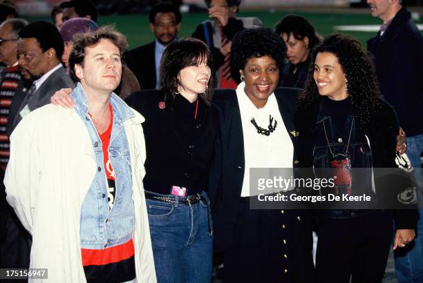 Jim Kerr, Chrissie Hynde, Winnie Madikizela-Mandela and Neneh Cherry attend backstage a concert held at Wembley Stadium to celebrate the release of...