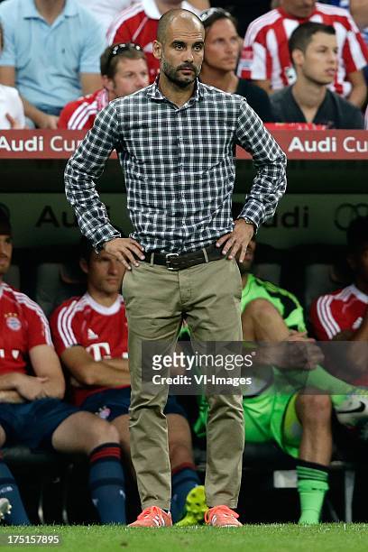 Coach Pep Guardiola of FC Bayern Munchen during the Audi Cup match between Bayern Munich and Sao Paolo FC on July 31, 2013 at the Allianz Arena in...